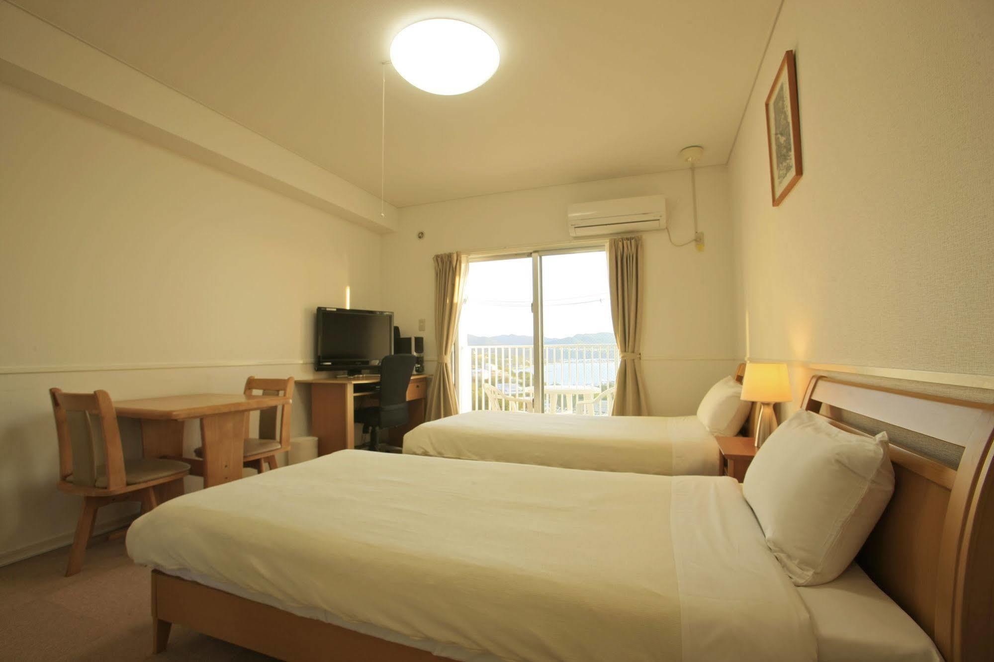 Condominium Alma Resort Hotel Motobu Bagian luar foto